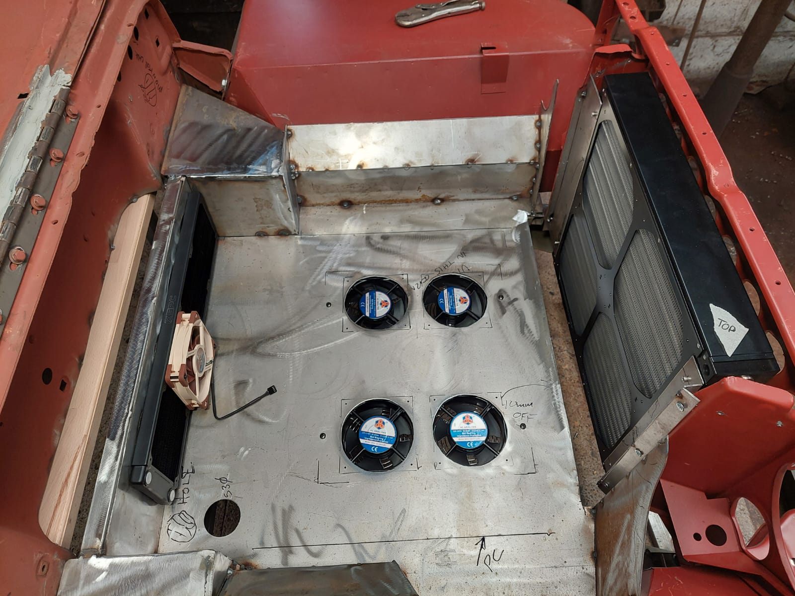 Front and rear radiators with the fan-tray layout inside the Willys Jeep custom PC project